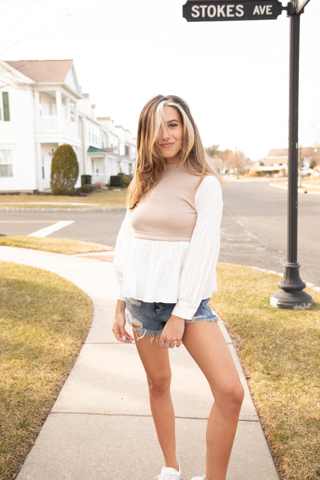 Leave The Vest To Us Two Tone Peplum Top